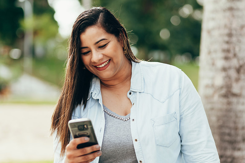 A person checks their phone.